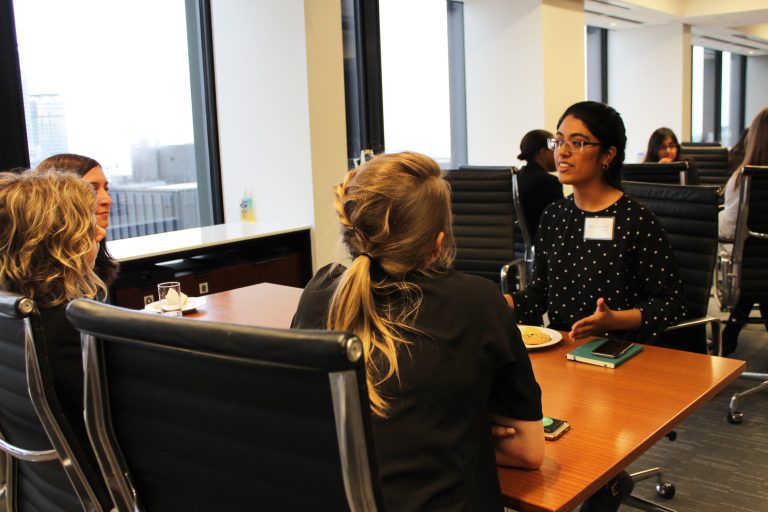 Three WeirFoulds mentors conversing with a GEM participant