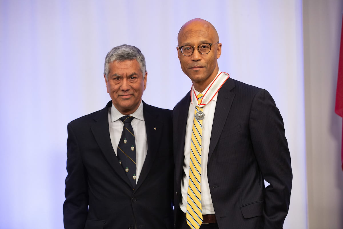 WeirFoulds Partner Raj Anand stands with Frank Walwyn after he is awarded a 2019 LSM